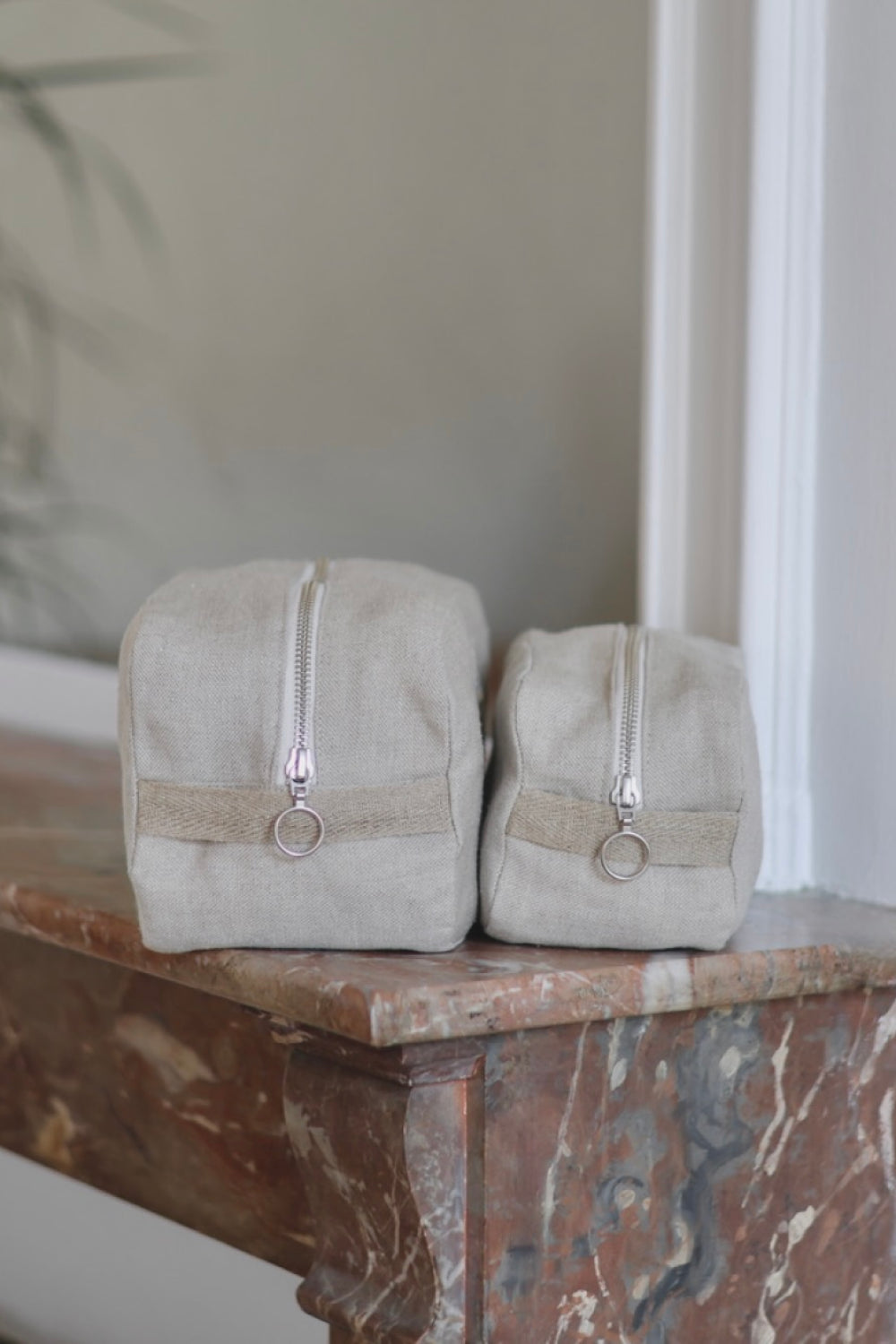 La trousse de toilette beige