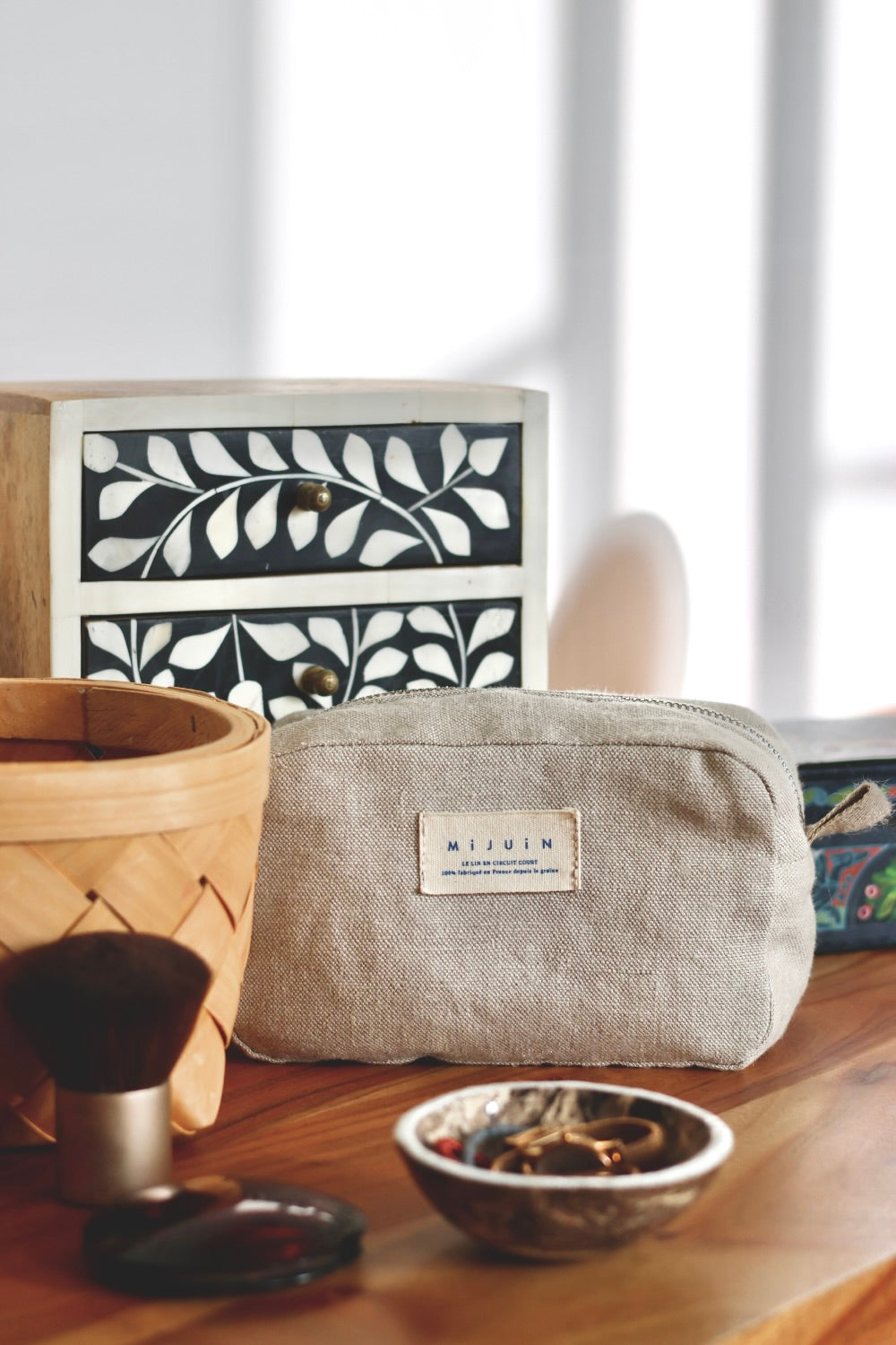 La trousse de toilette beige