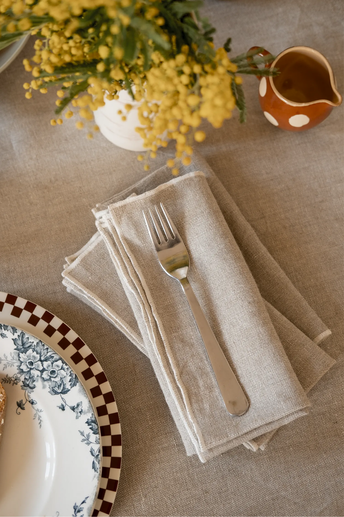 Le duo de serviettes de table bourdon blanc