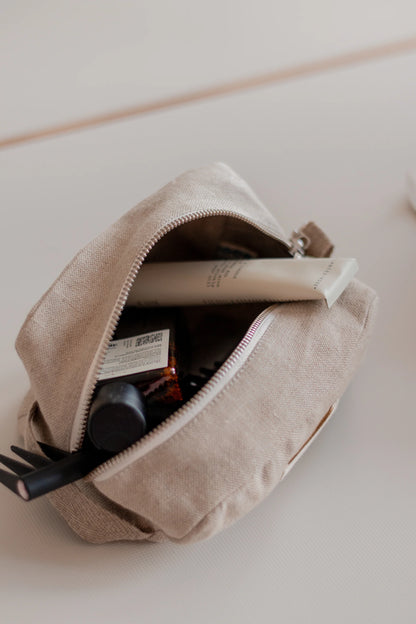 La trousse de toilette beige
