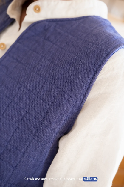 La veste sans manche bleue