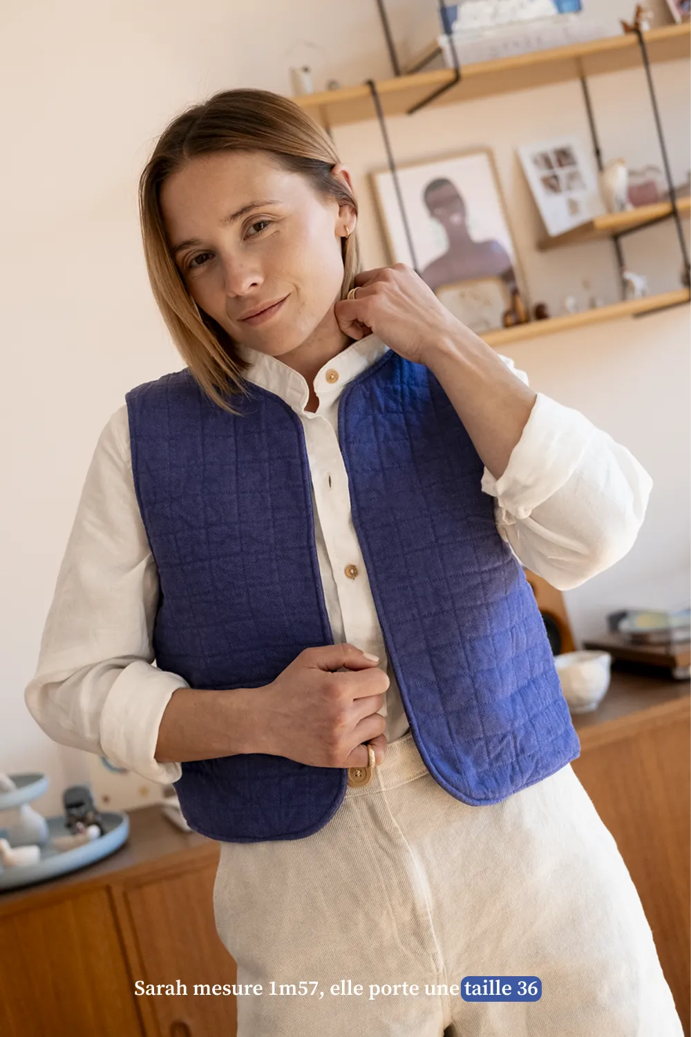 La veste sans manche bleue